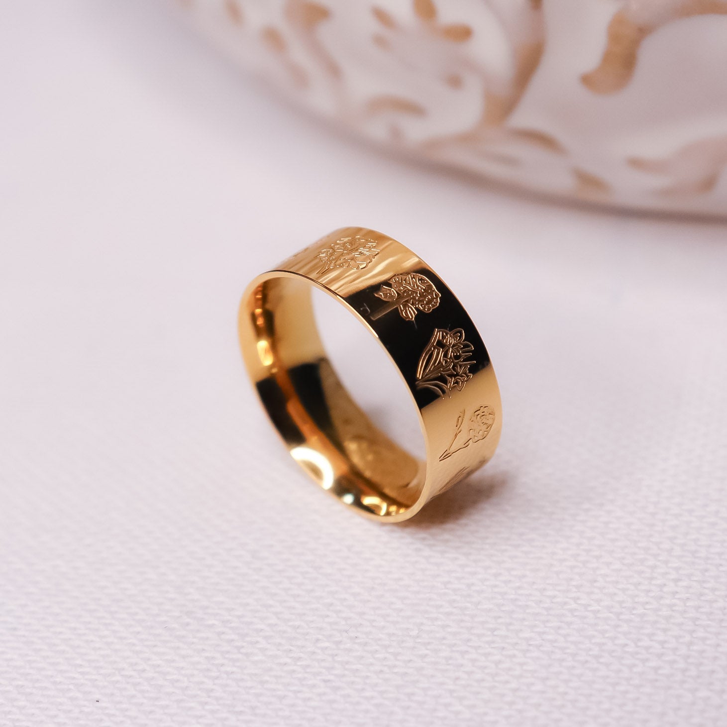 Birth Flowers Ring - Fierce Creative Co. Birth Flowers Ring - Fierce Creative Co. - Waterproof Jewelry - Gold Band with flowers engraved representing various birth flowers 